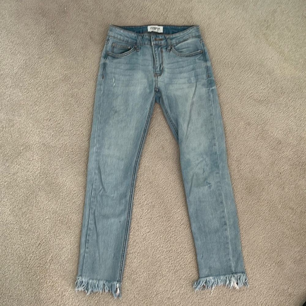 Light wash jeans raw hem